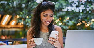 woman looking at mobile phone